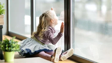 girl by a window