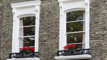 two wooden windows with double glazing