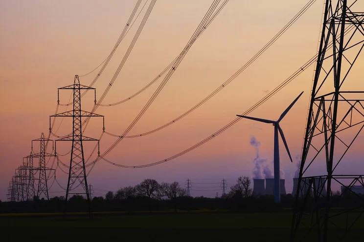 National Grid pylons against a sunset