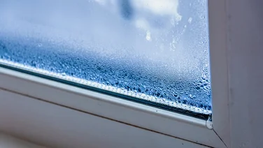 Condensation in between window panes in a double-glazed window