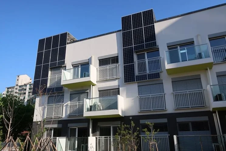 solar panels on wall of two semi-detached homes